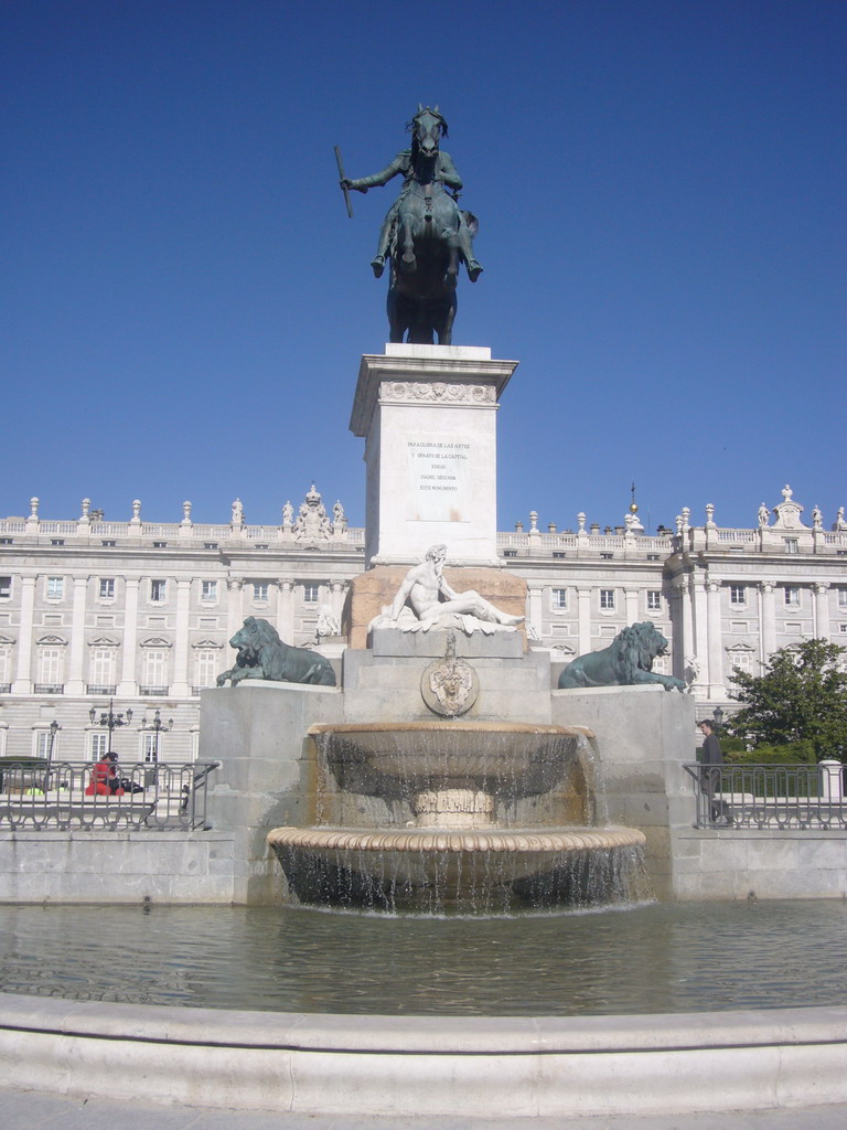 The equestrian statue of Philip IV at the Plaza de Oriente square, and the east side of the Royal Palace