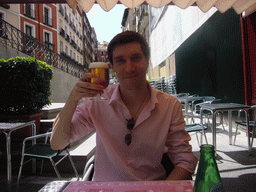 Tim having beer at the Café del Real at the Plaza de Isabel II square