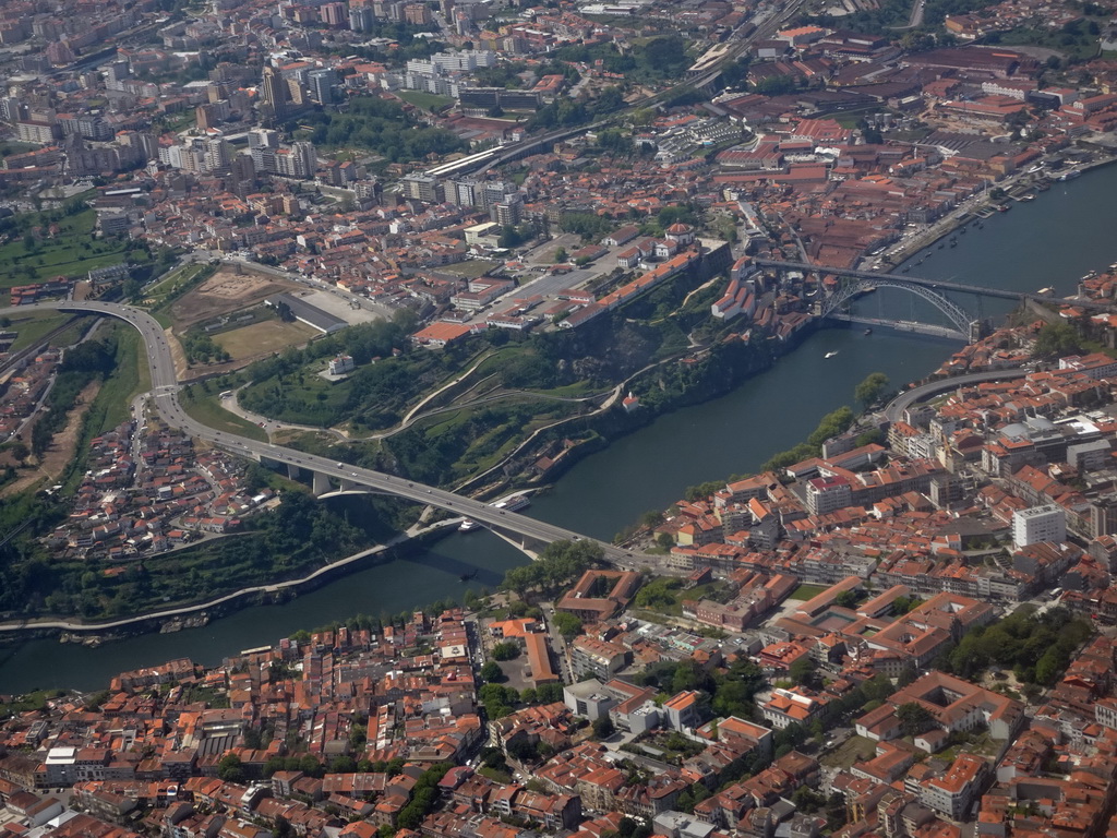 The Ponte Infante Dom Henrique and Ponte Luís I bridges over the Douro river and the Mosteiro da Serra do Pilar monastery, viewed from the airplane from Eindhoven