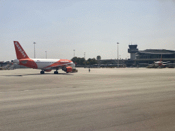 Airplanes and control tower at the Francisco Sá Carneiro Airport, viewed from the airplane