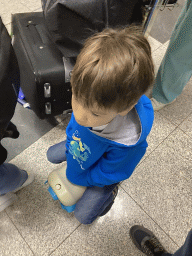 Max on his suitcase at the Departures Hall at the Francisco Sá Carneiro Airport