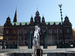 Fountain and Malmö Town Hall at Stortorget square, and the tower of Sankt Petri Kyrka church
