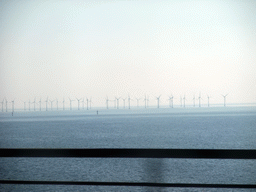 Windmills at the south side of the Öresund Bridge, viewed from the train on the Öresund Bridge from Malmö to Copenhagen