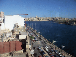 Marsamxett Harbour, Manoel island and Valletta with the dome of the Carmelite Church and the tower of St Paul`s Pro-Cathedral, viewed from the breakfast room of the Marina Hotel