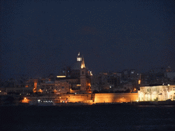 Marsamxett Harbour and Valletta with the dome of the Carmelite Church and the tower of St Paul`s Pro-Cathedral, by night