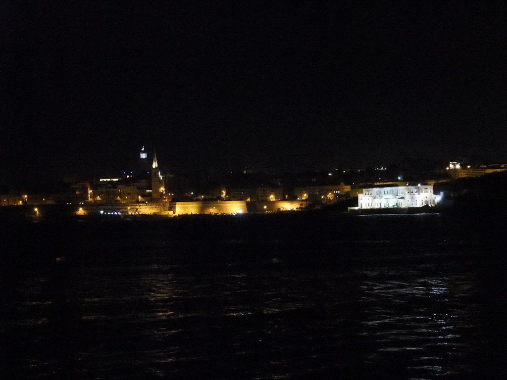 Marsamxett Harbour, Manoel Island and Valletta with the dome of the Carmelite Church and the tower of St Paul`s Pro-Cathedral, by night