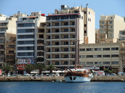 The Tigné Seafront with the front of the Marina Hotel, viewed from the Luzzu Cruises tour boat from Sliema to Marsaxlokk