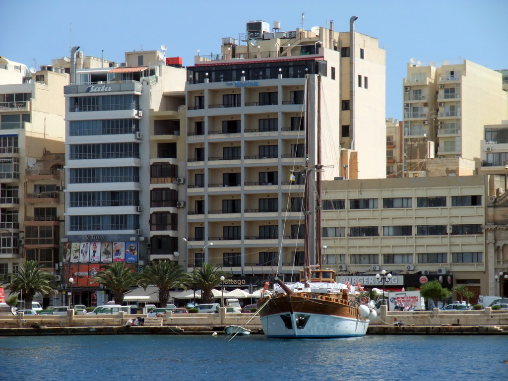 The Tigné Seafront with the front of the Marina Hotel, viewed from the Luzzu Cruises tour boat from Sliema to Marsaxlokk