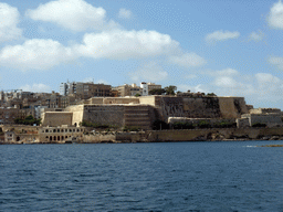 City Walls at the west side of Valletta, viewed from the Luzzu Cruises tour boat from Sliema to Marsaxlokk