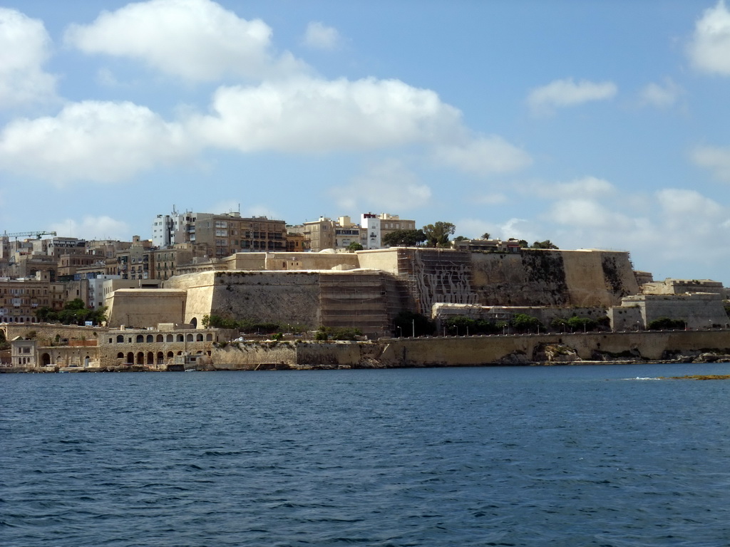 City Walls at the west side of Valletta, viewed from the Luzzu Cruises tour boat from Sliema to Marsaxlokk