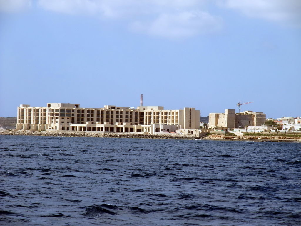 The town of Marsaskala with St. Thomas Tower, viewed from the Luzzu Cruises tour boat from Sliema to Marsaxlokk