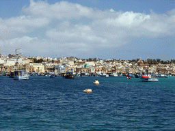 Boats in the harbour of Marsaxlokk, viewed from the Luzzu Cruises tour boat from Sliema to Marsaxlokk