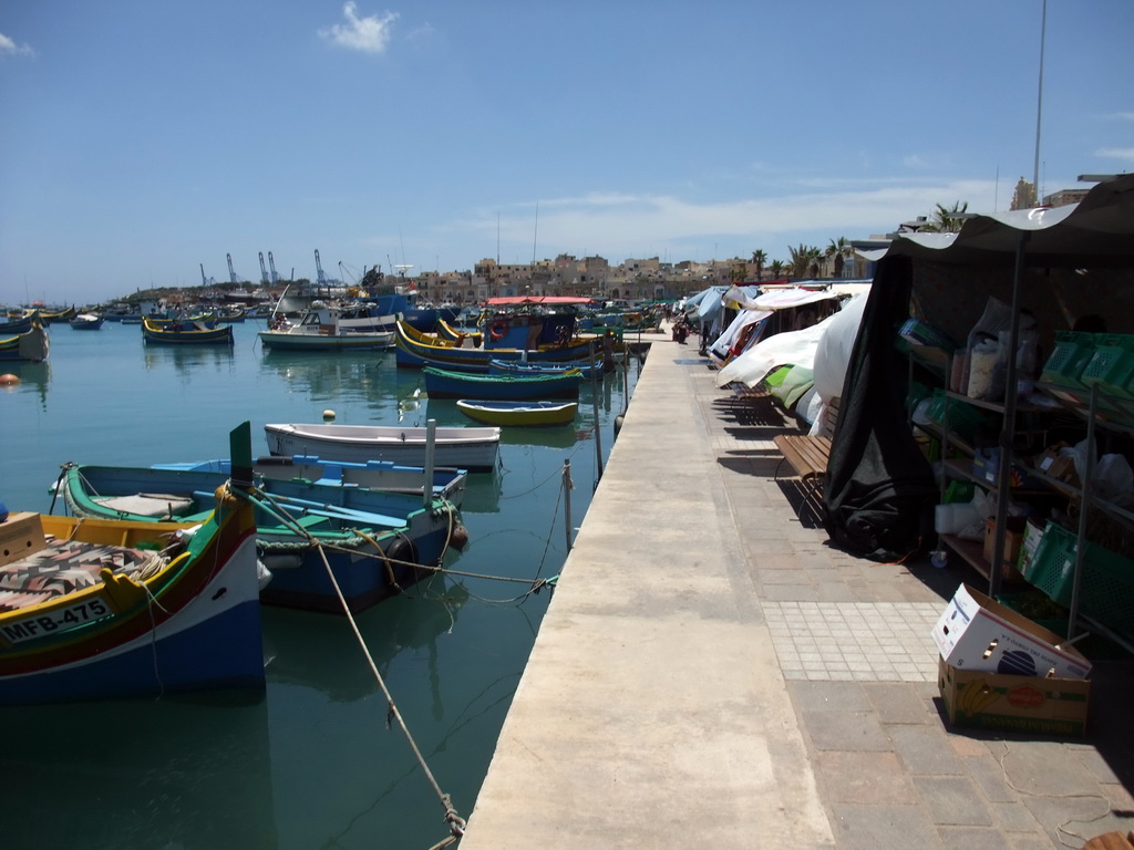 Fish market and fishing boats at the harbour of Marsaxlokk