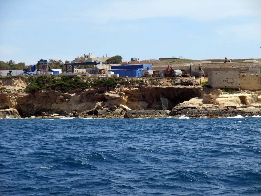 Fort Rinella with the world`s largest cannon, and the Mediterranean Film Studios in Rinella, viewed from the Luzzu Cruises tour boat from Marsaxlokk to Sliema