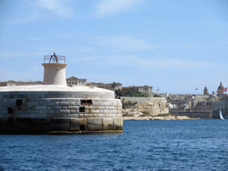 The Grand Harbour with the pier at Fort Ricasoli and the Three Cities, viewed from the Luzzu Cruises tour boat from Marsaxlokk to Sliema