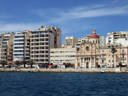 The Tigné Seafront with the front of the Marina Hotel and the Parish Church of Jesus of Nazareth, viewed from the Luzzu Cruises tour boat from Marsaxlokk to Sliema