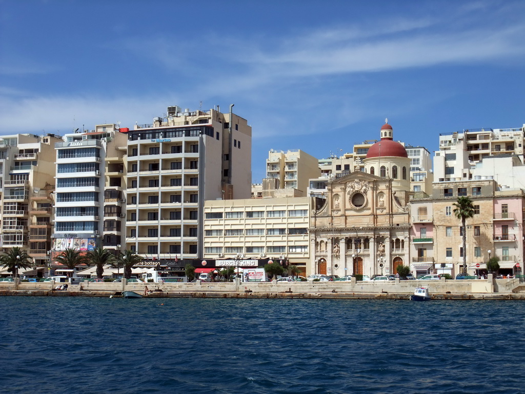 The Tigné Seafront with the front of the Marina Hotel and the Parish Church of Jesus of Nazareth, viewed from the Luzzu Cruises tour boat from Marsaxlokk to Sliema