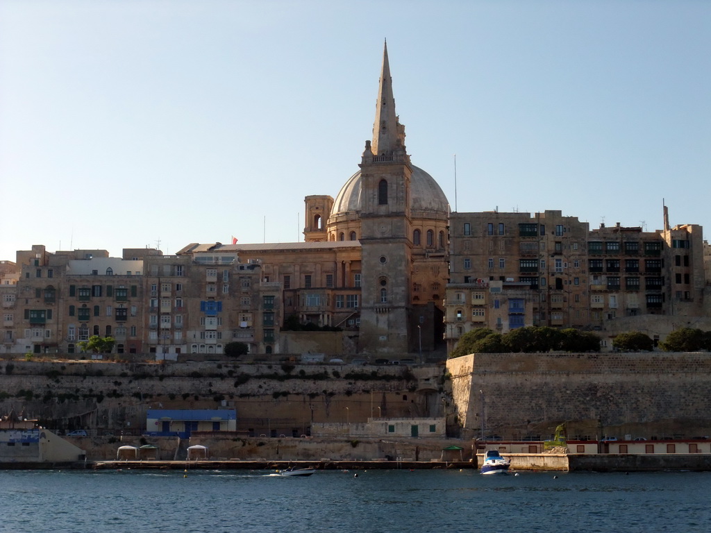 Valletta with the dome of the Carmelite Church and the tower of St Paul`s Pro-Cathedral, viewed from the ferry from Sliema to Valletta