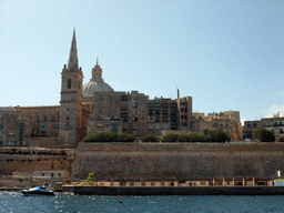 The Valletta United Waterpolo Pitch, and Valletta with the dome of the Carmelite Church and the tower of St Paul`s Pro-Cathedral, viewed from the ferry from Sliema to Valletta