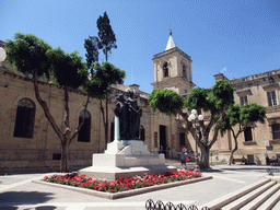 Monument of the Great Siege and the southwest side of St. John`s Co-Cathedral at the Great Siege Square at Valletta