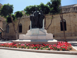 Monument of the Great Siege and the southwest side of St. John`s Co-Cathedral at the Great Siege Square at Valletta