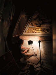 Restoration worker in the Passage at St. John`s Co-Cathedral at Valletta