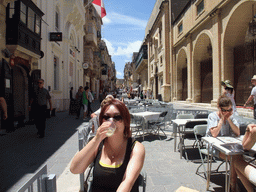 Miaomiao having drinks on a terrace at Triq Il-Merkanti street at Valletta