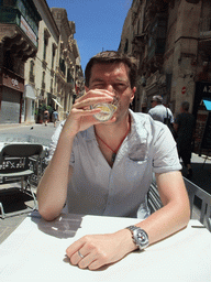 Tim having drinks on a terrace at Triq Il-Merkanti street at Valletta