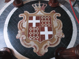 Old Maltese Coat of Arms on the floor of the Corridor of the Knights in the Grandmaster`s Palace at Valletta