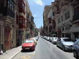 The Triq I-Ifran street with the Parish Church of St. Augustine and the St. John`s Cavalier building at Valletta