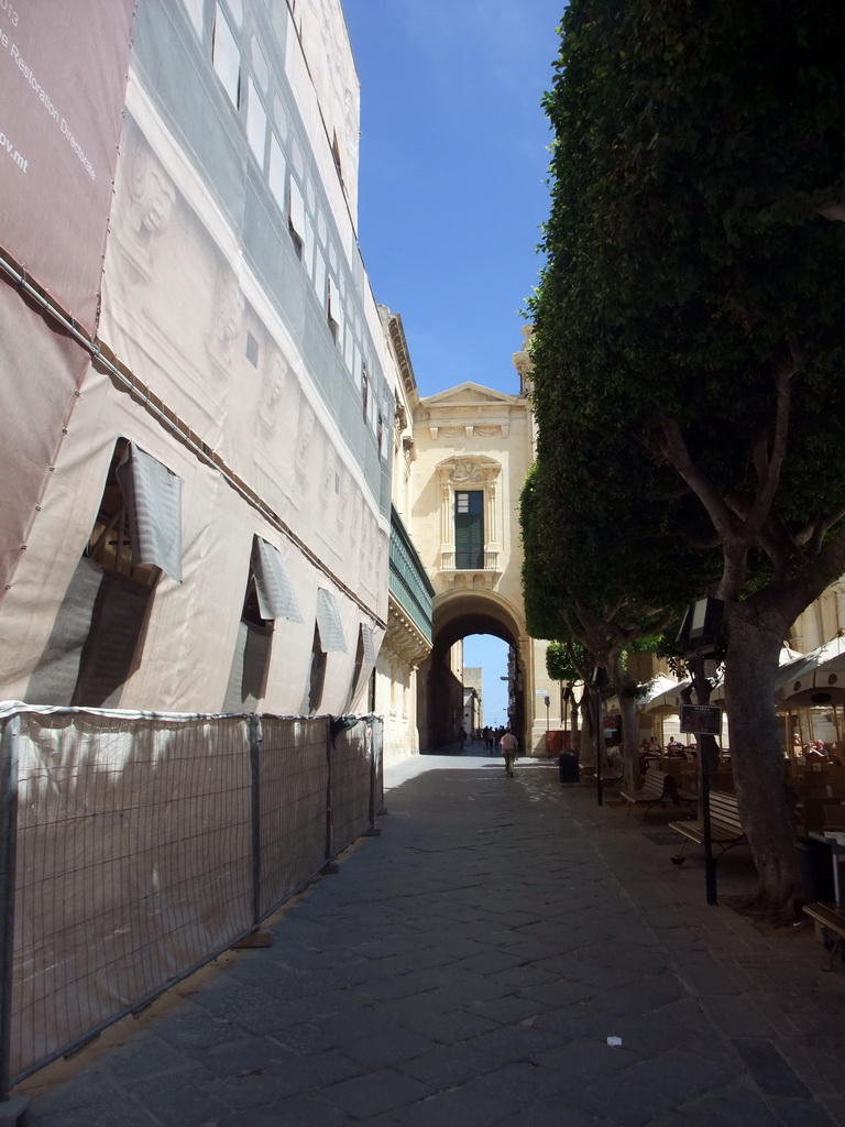 Republic Square with a passageway between the Grandmaster`s Palace and the National Library at Valletta