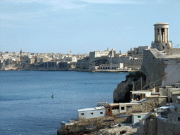 The Grand Harbour, the Siege Bell Monument and Fort St. Angelo, viewed from the Mediterranean Street at Valletta