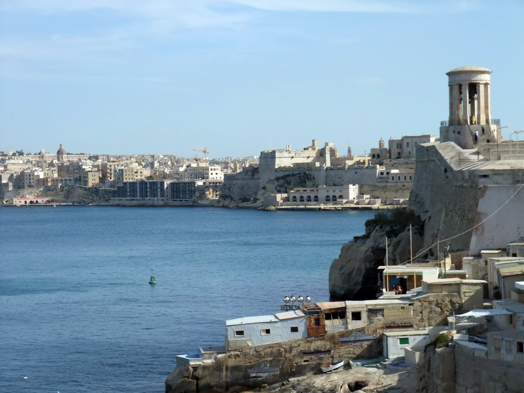 The Grand Harbour, the Siege Bell Monument and Fort St. Angelo, viewed from the Mediterranean Street at Valletta