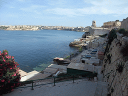The Grand Harbour, the Siege Bell Monument, the Lower Barracca Gardens, Villa Bighi at the town of Kalkara and Fort St. Angelo, viewed from the Mediterranean Street at Valletta