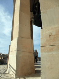 Tim with the bell at the Siege Bell Monument at Valletta