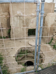 Hole in the ground at the Chamber of Animal Reliefs at the Tarxien Temples at Tarxien