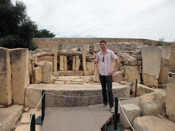 Tim with the main altar of the Southwestern Temple of the Tarxien Temples at Tarxien
