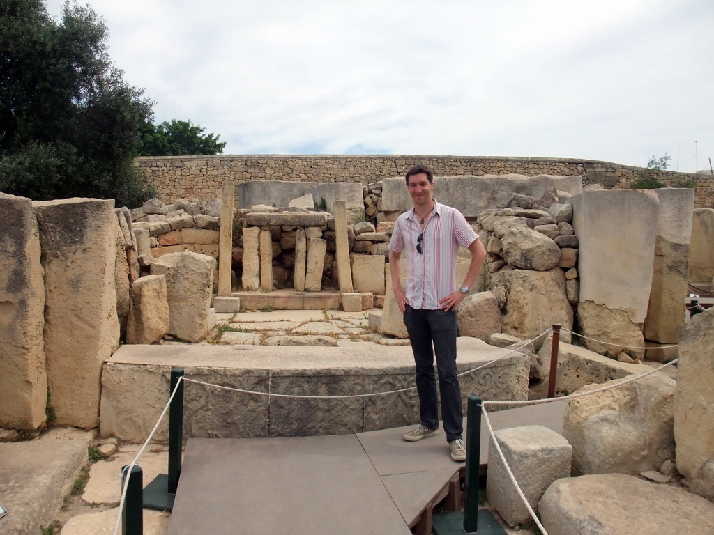 Tim with the main altar of the Southwestern Temple of the Tarxien Temples at Tarxien