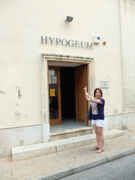 Miaomiao at the entrance to the Hypogeum of Hal-Saflieni at Paola