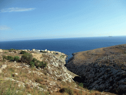 The Wied iz-Zurrieq valley and the island of Filfla in the Mediterranean Sea, viewed from the Triq Wied Iz-Zurrieq street