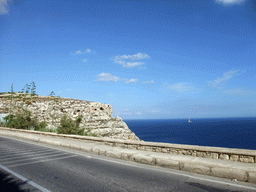 The Triq Wied Iz-Zurrieq street, plants and rocks near the Blue Grotto and the Mediterranean Sea