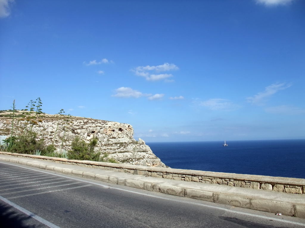 The Triq Wied Iz-Zurrieq street, plants and rocks near the Blue Grotto and the Mediterranean Sea