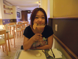 Miaomiao having a cocktail in the restaurant `The Kitchen` at the Triq It-Torri street at St. Julian`s