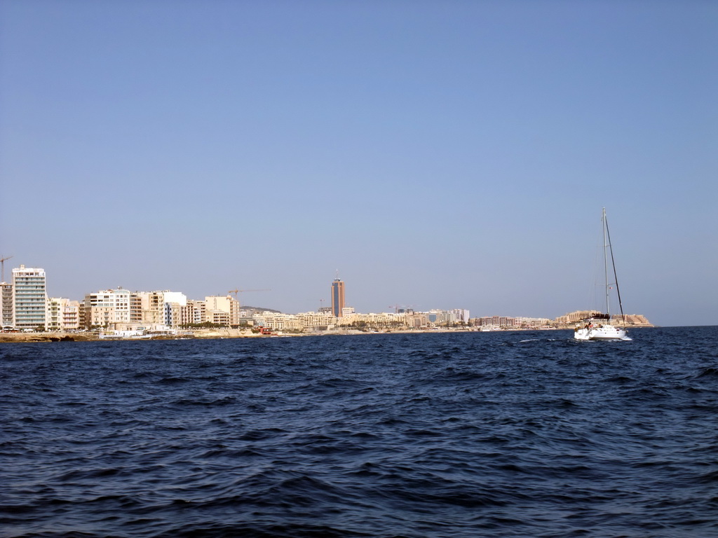 St. Julian`s and the Hilton Malta Hotel, viewed from the Luzzu Cruises tour boat from Malta to Gozo