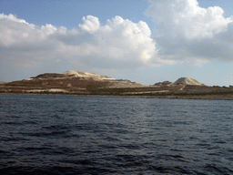 The Maghtab waste disposal site, viewed from the Luzzu Cruises tour boat from Comino to Malta