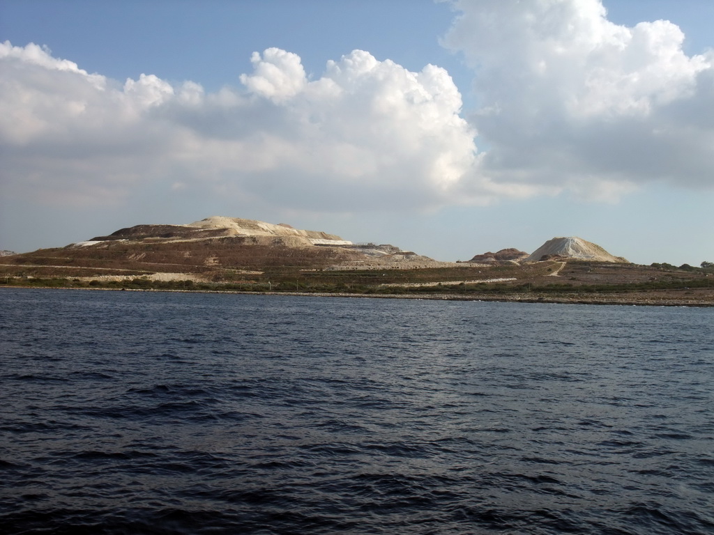 The Maghtab waste disposal site, viewed from the Luzzu Cruises tour boat from Comino to Malta