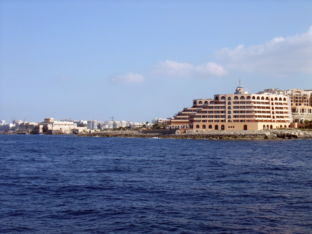 St. Julian`s with the Radisson Blu Resort and the Dragonara Point with the Dragonara Casino, viewed from the Luzzu Cruises tour boat from Comino to Malta