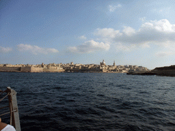 Valletta with Fort Saint Elmo, the dome of the Carmelite Church and the tower of St Paul`s Pro-Cathedral, viewed from the Luzzu Cruises tour boat from Comino to Malta