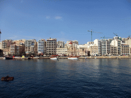 The Tigné Seafront with the front of the Marina Hotel and the Parish Church of Jesus of Nazareth, viewed from the Luzzu Cruises tour boat from Comino to Malta