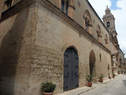 The Palazzo Santa Sofija building and the tower of the Carmelite Cathedral at the Triq Villegaignon street at Mdina